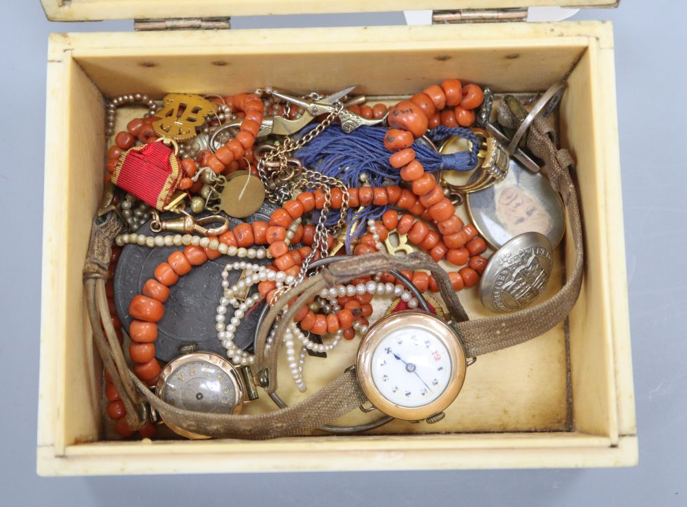 A Victorian gold mounted ivory box, containing two gold wrist watches and sundry jewellery